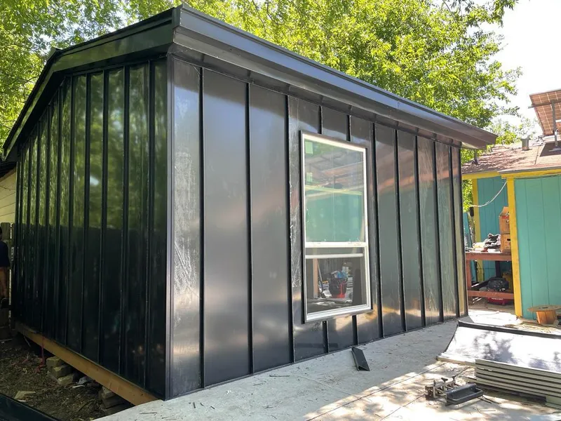 Black standing seam metal wall panels for Roof Inspection in Monahans