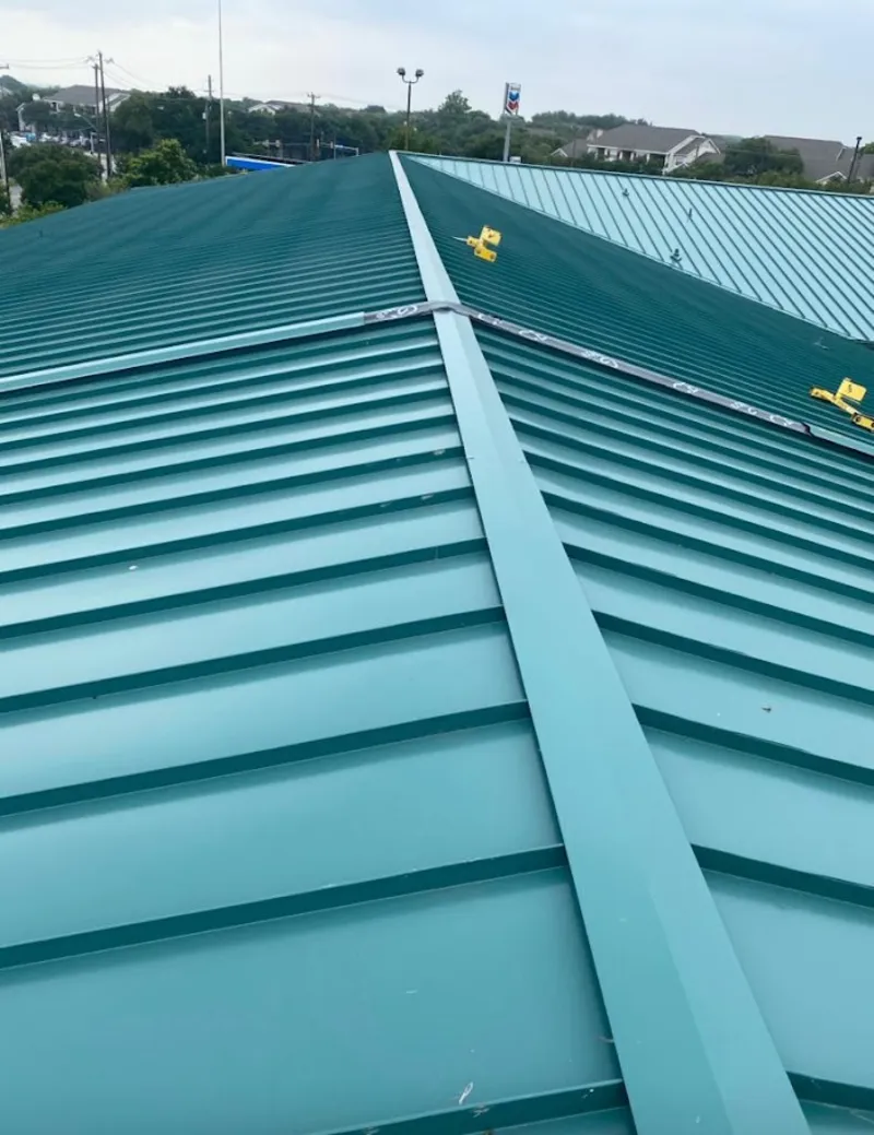 Green commercial metal roof ridge and valley for Metal Roof Repair in Monahans